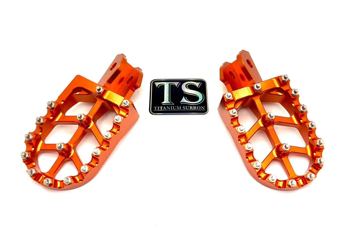 Titanium Surron 6061 TS burnt orange anodized aluminum foot pegs for Surron and e-moto bikes.