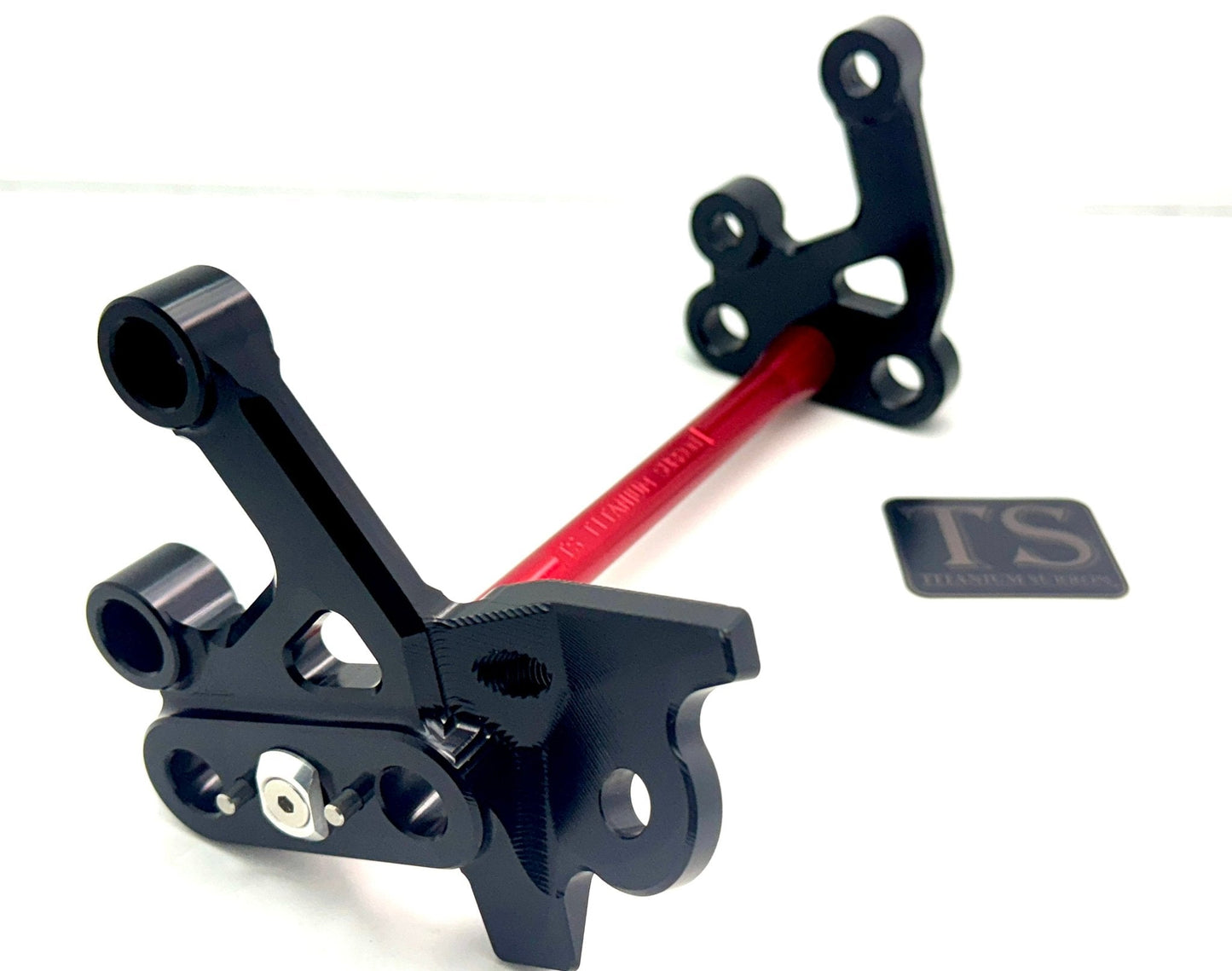Custom CNC Aluminum Footpeg Bracket Assembly Surron - Howling Moto