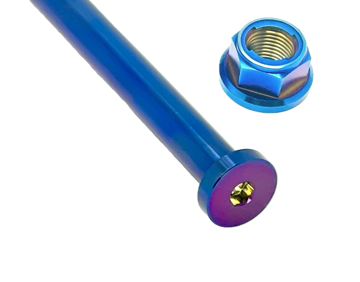 Titanium Surron rear axle and nut set in black titanium for Surron LBX electric bike, includes two titanium bolts and nuts.