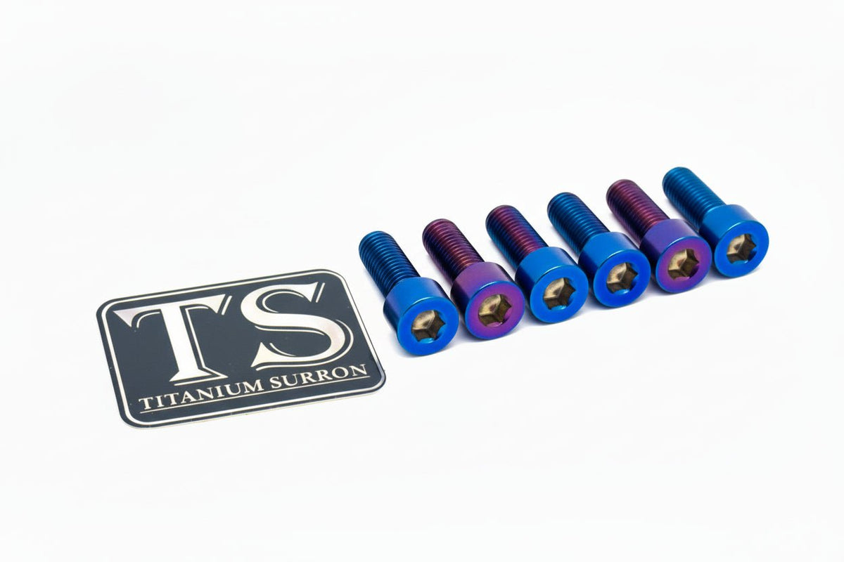 Blue titanium rear sprocket bolts for Surron electric bikes by Titanium Surron, lightweight and durable titanium bolts for motorcycle maintenance.
