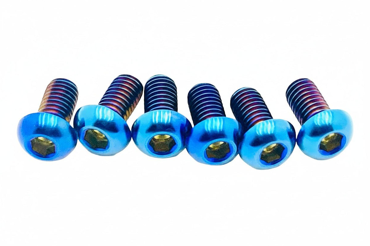 Titanium Surron front rotor bolts in green for light e-moto, Grade 5 6AL-4V titanium bolts for Segway, Talaria, and more.