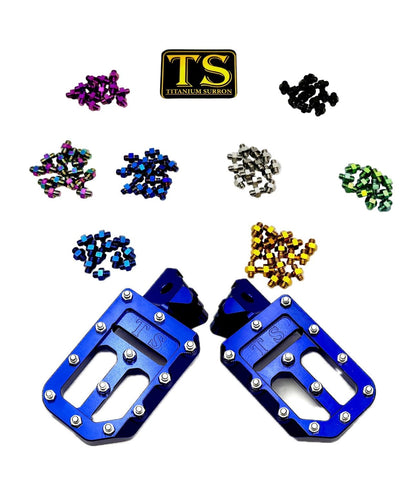 Titanium Surron custom foot pegs with titanium grips for Surron and light e-moto bikes, featuring durable metal construction.