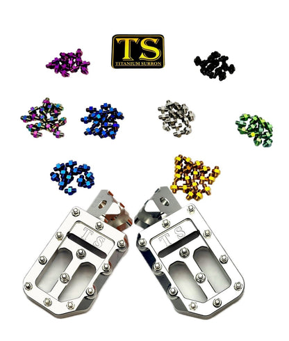 Titanium Surron custom foot pegs with titanium grips for Surron and light e-moto bikes, featuring durable, lightweight design.