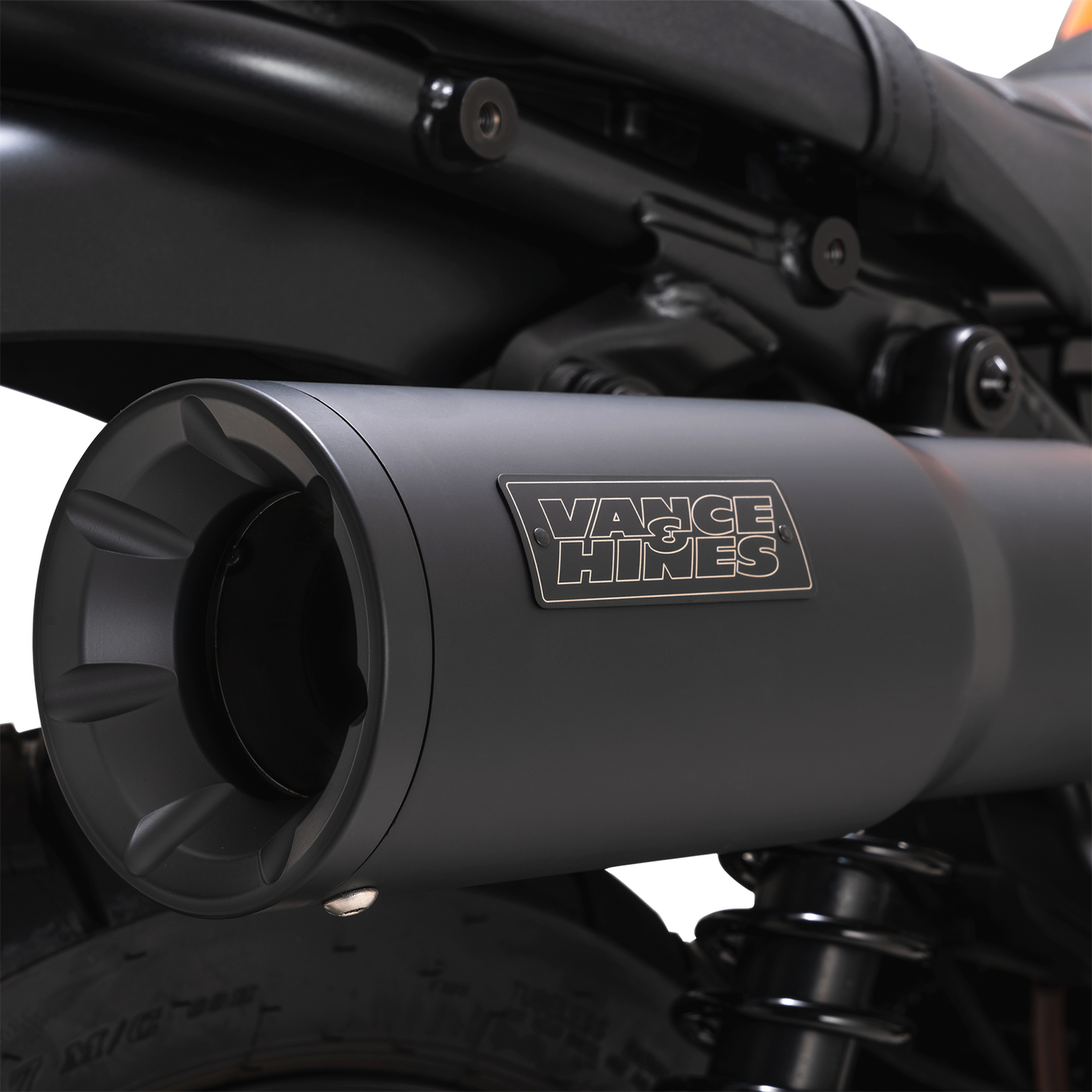 Vance & Hines Hi-Output Slip-On Muffler for motorcycles, showcasing polished chrome finish and sleek design.