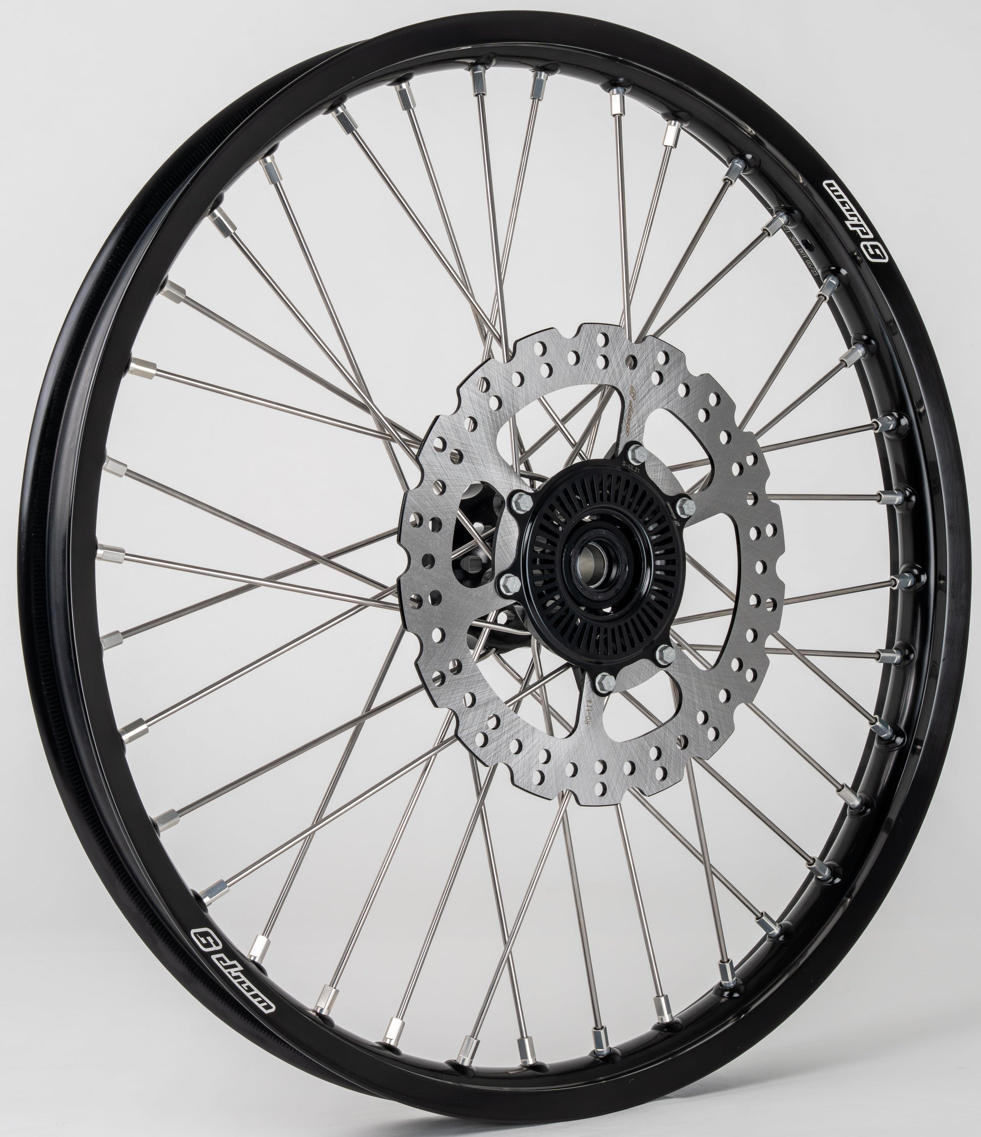 Black and silver Warp9Racing Surron Ultra front wheel with 21x1.60 fitment, featuring a sleek design and durable construction.