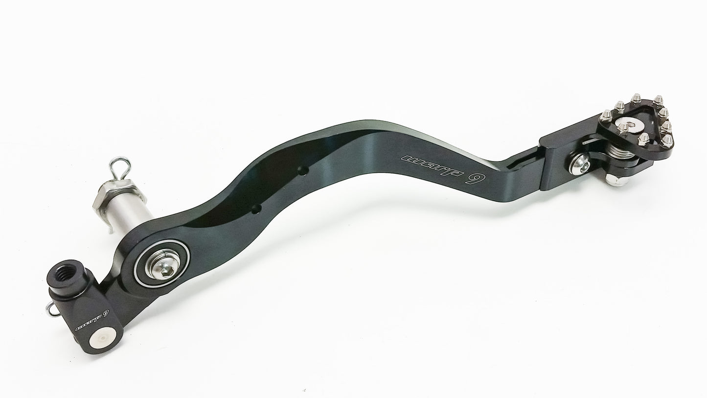 Warp9Racing DR650 brake pedal, durable motorcycle brake pedal with textured surface for improved grip, designed for off-road riding.