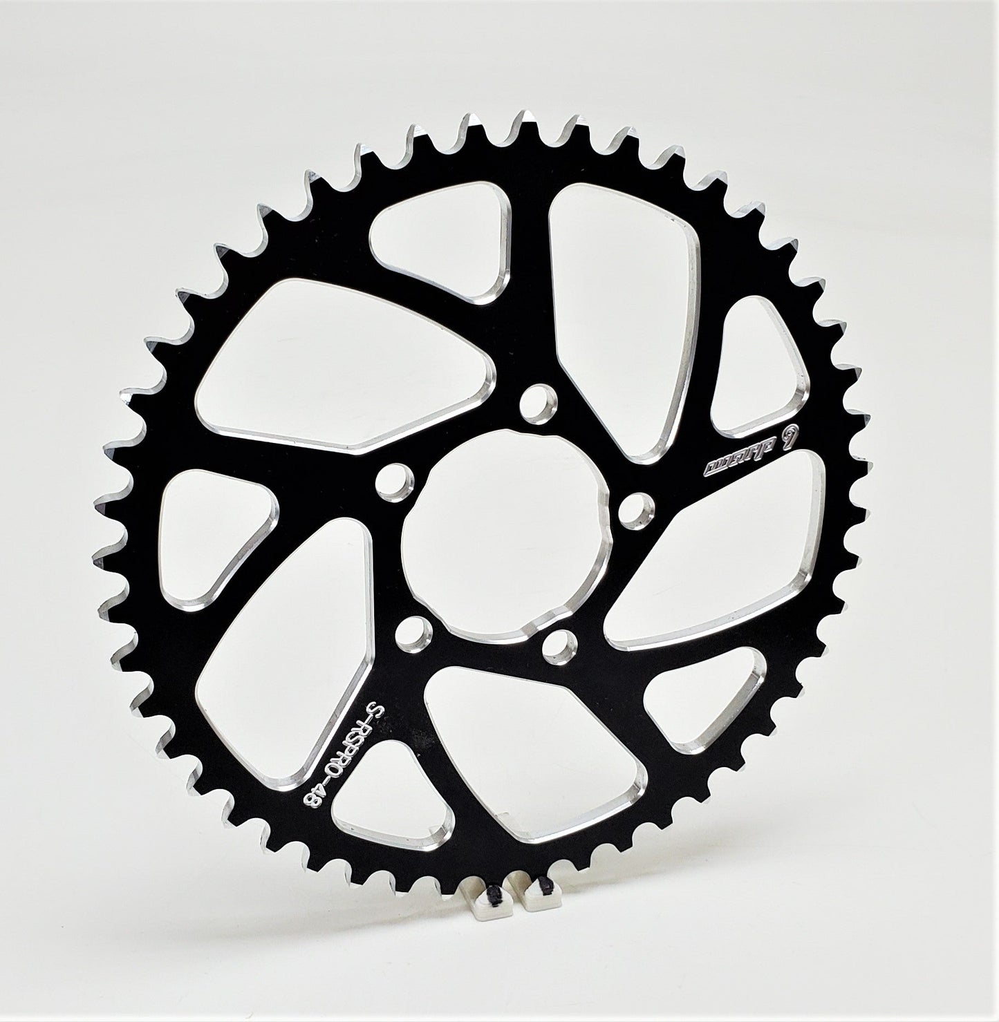 Warp 9 Racing E-Moto rear sprocket, aluminum and stainless steel, 40-tooth black sprocket for Surron, Talaria, and more electric bikes.