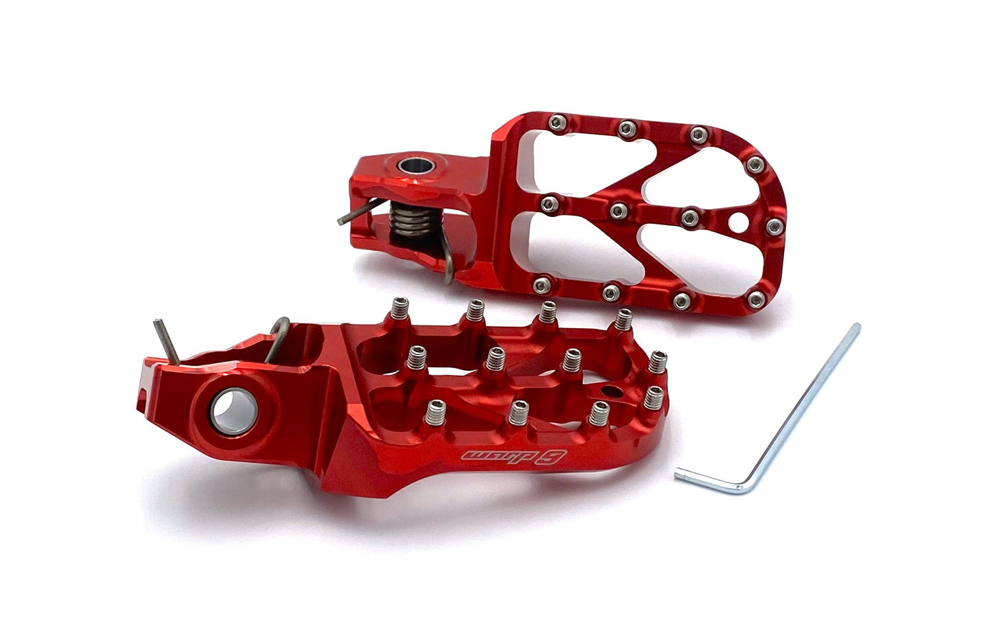 Warp9Racing Stark Varg Elite motorcycle foot pegs in silver, designed for durability and style on the bike.