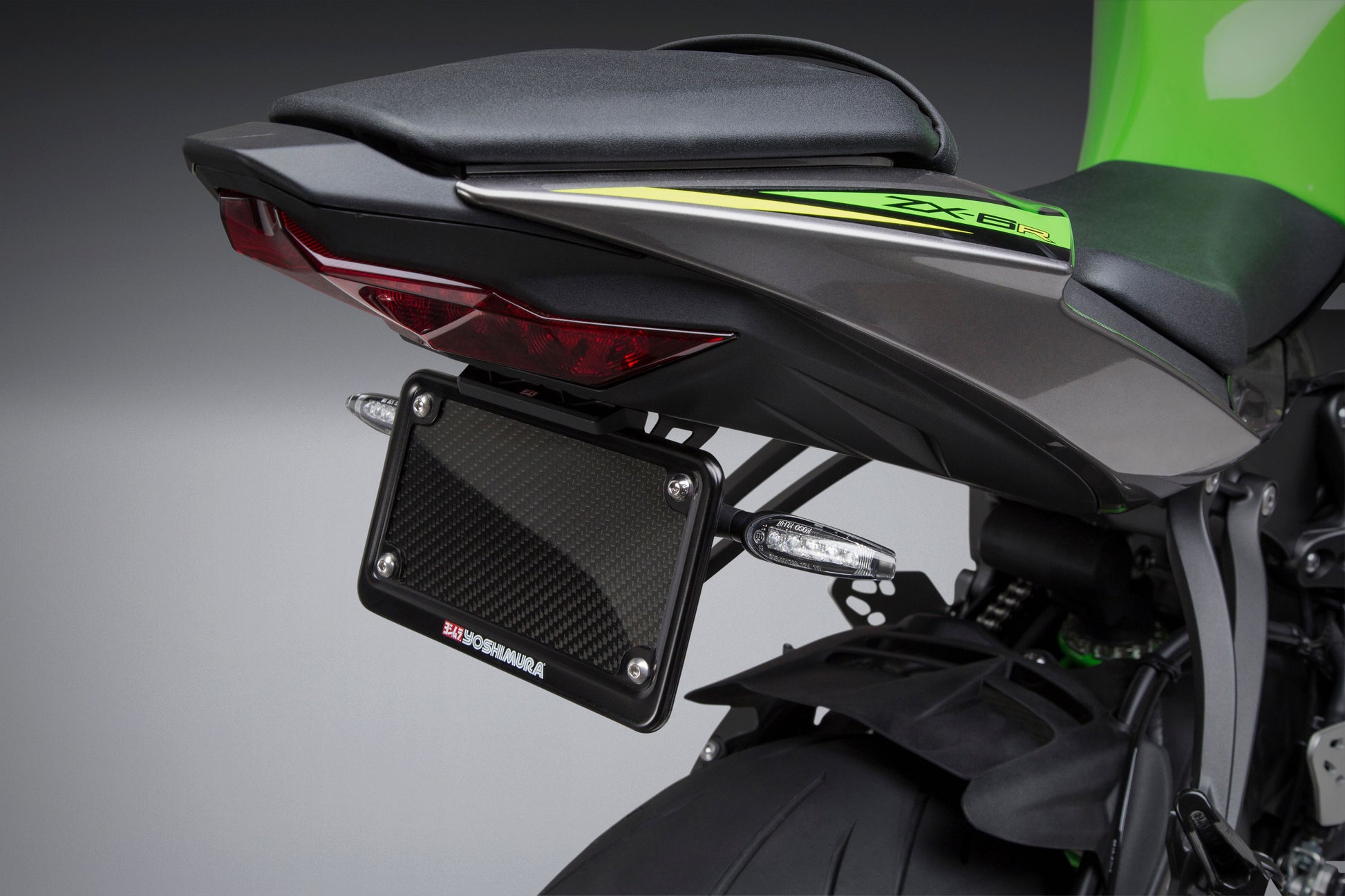 YOSHIMURA Fender Eliminator Kit for Kawasaki motorcycles, showing sleek black design and mounting hardware.