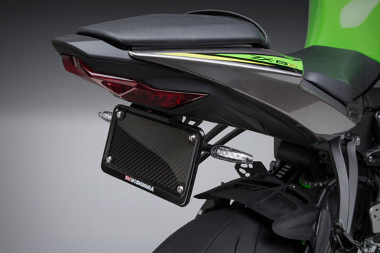 YOSHIMURA Fender Eliminator Kit for Kawasaki motorcycles, showing sleek black design and mounting hardware.