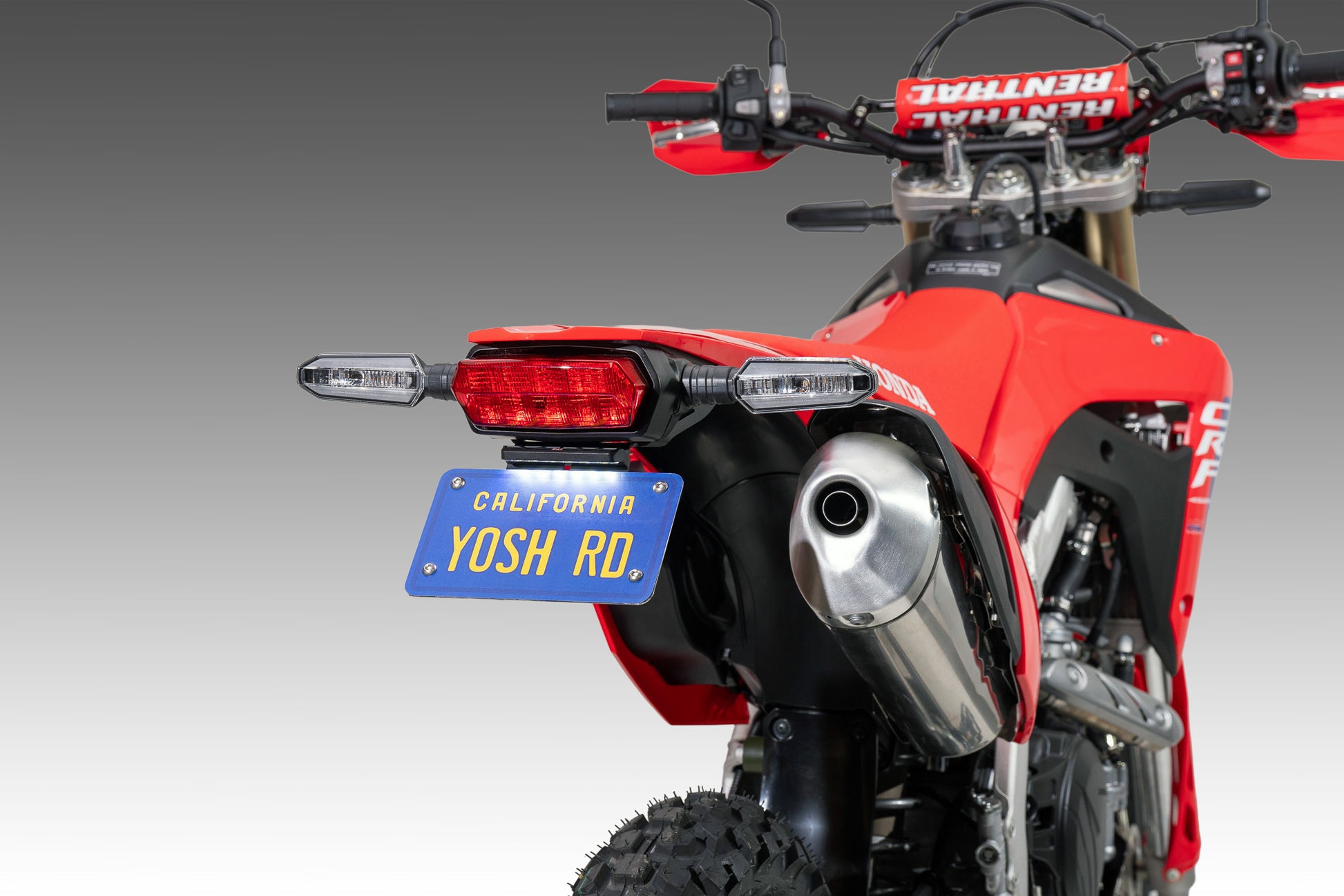YOSHIMURA V2 Fender Eliminator Kit for Honda models, sleek motorcycle rear end with license plate holder and LED light assembly.