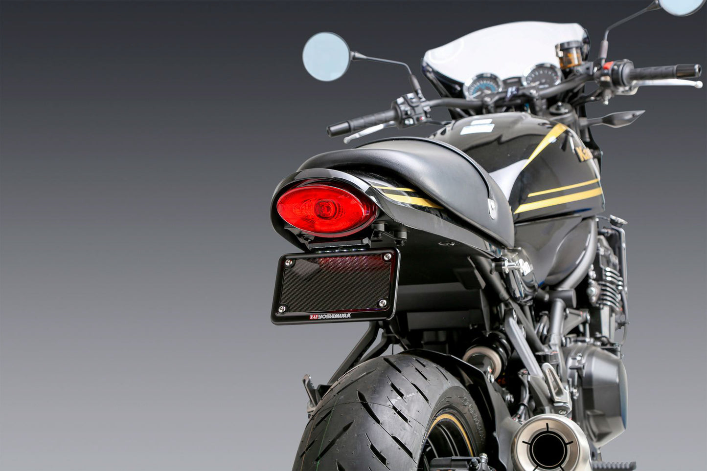 YOSHIMURA V2 Fender Eliminator Kit for Kawasaki motorcycles, black metal design with mounting brackets and LED license plate light.