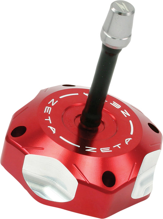 Red ZETA billet gas cap for motorcycles, part ZE87-1503, with sleek metal finish and secure locking mechanism.