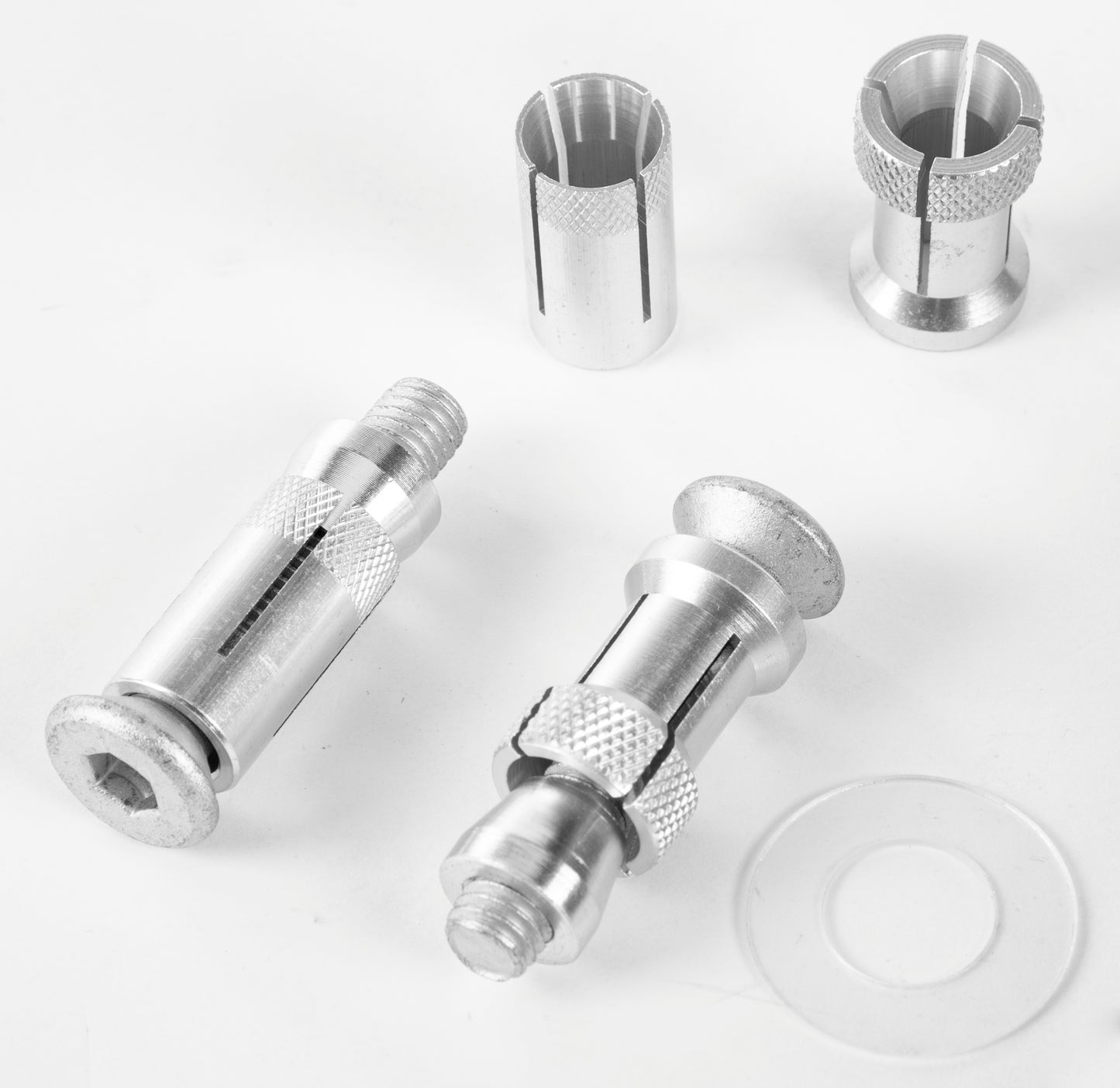 Pair of ZETA ZE71-7911 replacement Bushguard adapters, black metal protectors for motorcycle suspension protection.