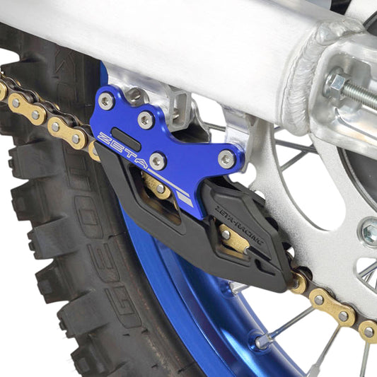 ZETA Yamaha ZETA ZE82-1306 3D chain guide mounted on motorcycle chain, showcasing enhanced durability and performance features.