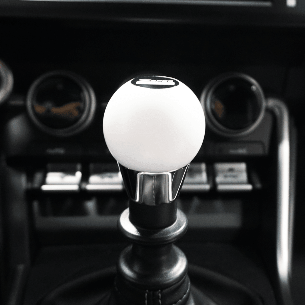 ZSPEC Shift Knob, M12-1.25, Delrin & Stainless, 4-Speed Shift Pattern Coin - Howling Moto